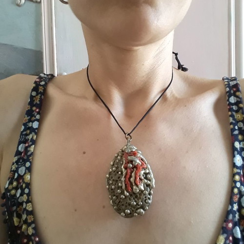 Vintage pendant like new made of stone, tin, and coral