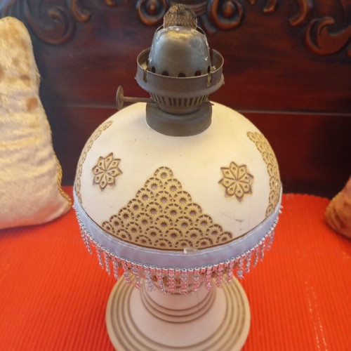 Vintage oil lamp used with intricate beautiful designs