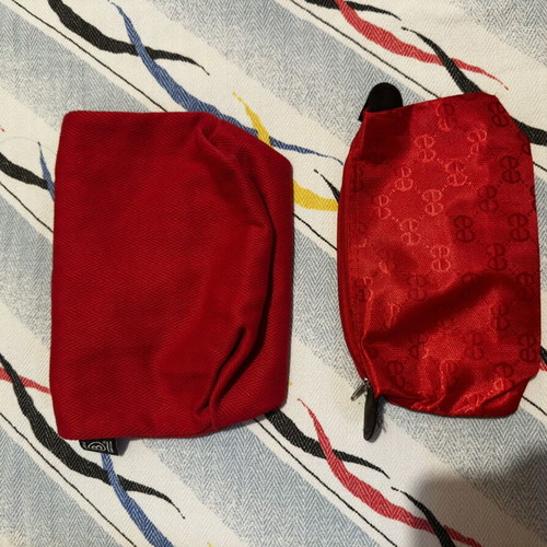 Red toiletry bags like new, set of 2, Apivita and Everyday