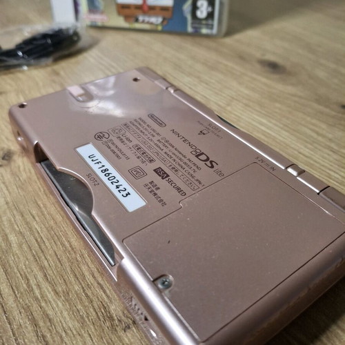 Nintendo DS Lite Metallic Rose used with SpongeBob game and charger