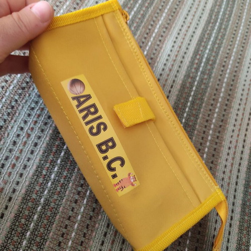 Aris B.C. yellow pencil case with logo