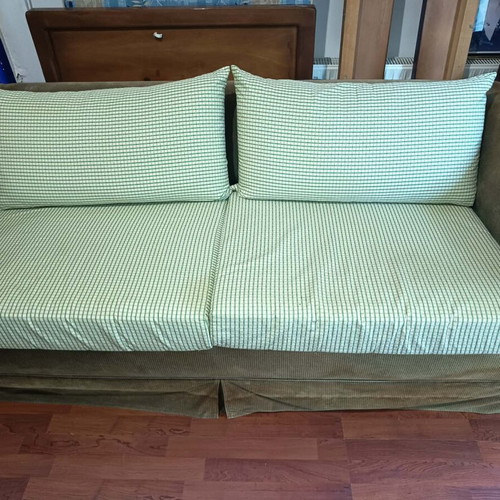 Two-seater sofa bed used