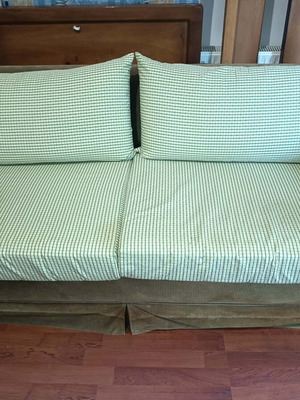 Two-seater sofa bed used