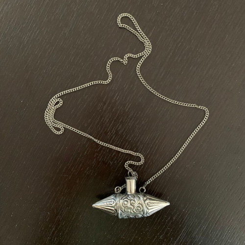 Vintage necklace with perfume holder used