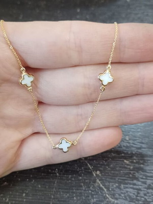 14 Carat Gold Necklace like new with 3 white van cleef charms
