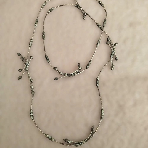 Long necklace like new with metallic beads gray silver