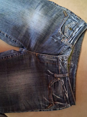 Jeans used, size 32, blue with frayed details