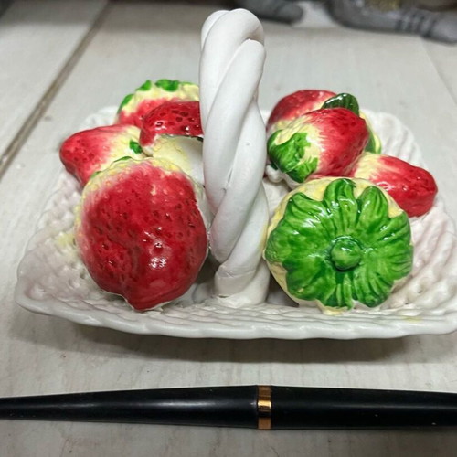 Small decorative basket with strawberries