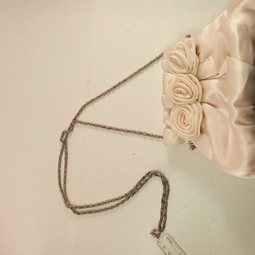 Skondras evening bridal bag used with roses and silver chain