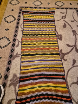 Handmade woven wool rug like new, brown and yellow