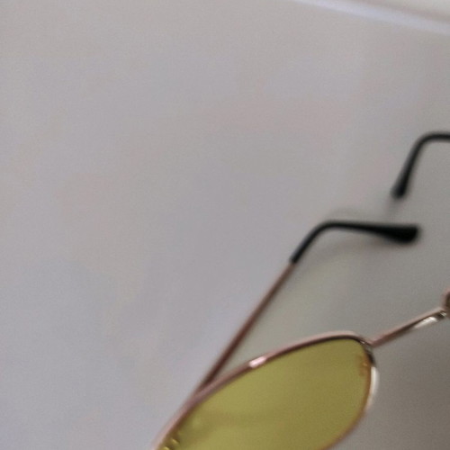 Sunglasses used with yellow lens and lightweight frame