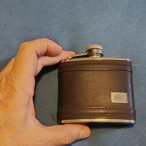 Flask 4oz stainless steel with leather cover like new