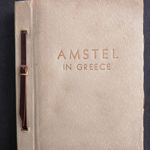 Amstel album with newspaper clippings from 1963 factory opening used