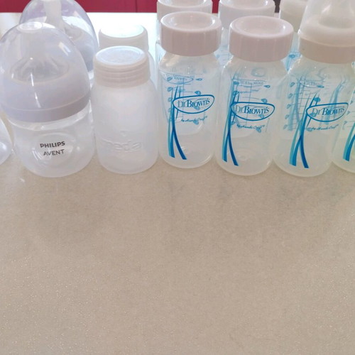 Baby bottles and milk storage containers, pack of 14