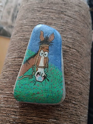 Painted stone new with acrylics and glossy varnish