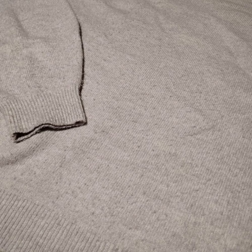 Pullover used in lilac color with knots
