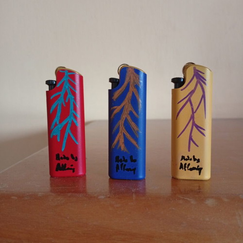 Hand-painted lighters with cat design, set of 3