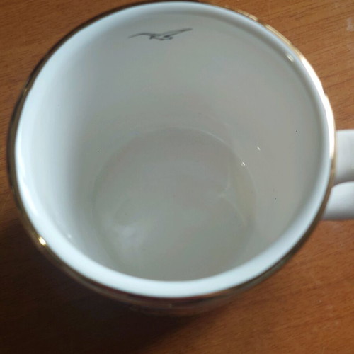 Handmade porcelain cup with 24k gold details like new