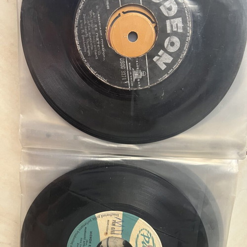 Vinyl 45 rpm records used, two cases with over fifty laiko and rembetika