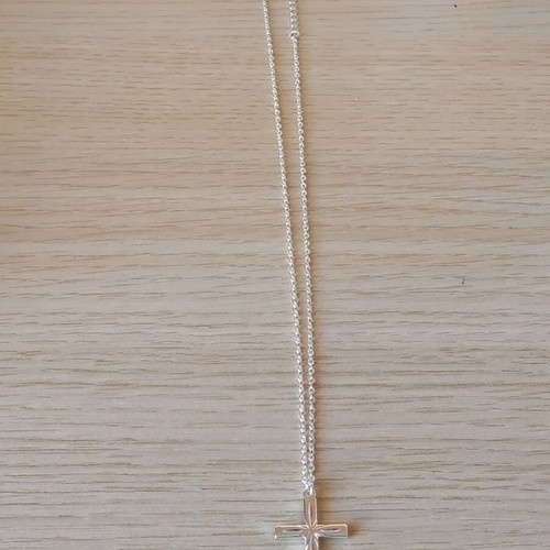 Steel cross like new, silver color