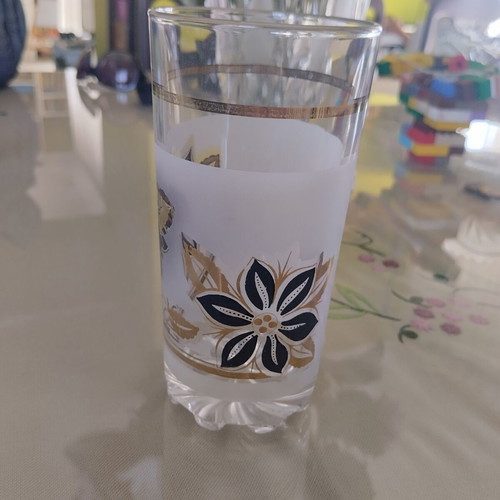 Vintage water glass like new with gold and black decoration