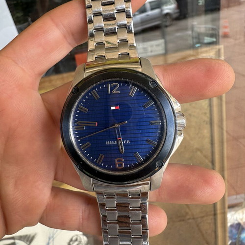 Tommy Hilfiger men's watch like new with blue dial and steel bracelet