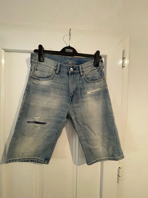 H & M - purposely distressed denim shorts age 13-14