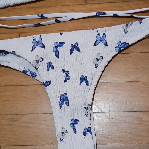 White Gofre Bikini with Blue Butterfly Design Size Medium like new