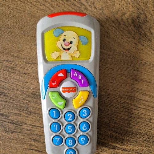 Fisher-Price Play and Learn Educational Remote like new with music and lights