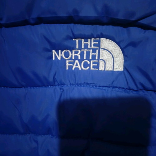 The North Face blue jacket like new, size M unisex