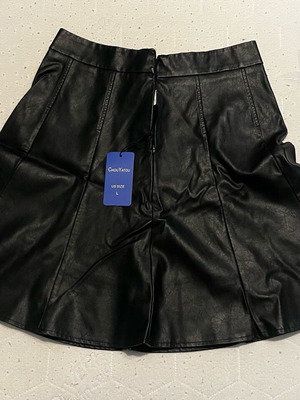 Black leatherette skirt new, knee-length with lining