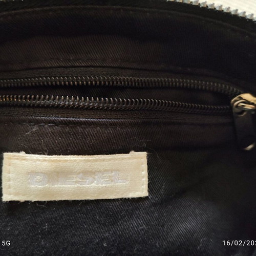 Diesel cotton jean clutch bag with leather patches and chain like new