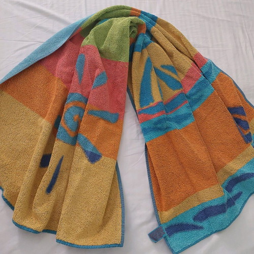 Beach and bath towels like new, 2 large, white and printed