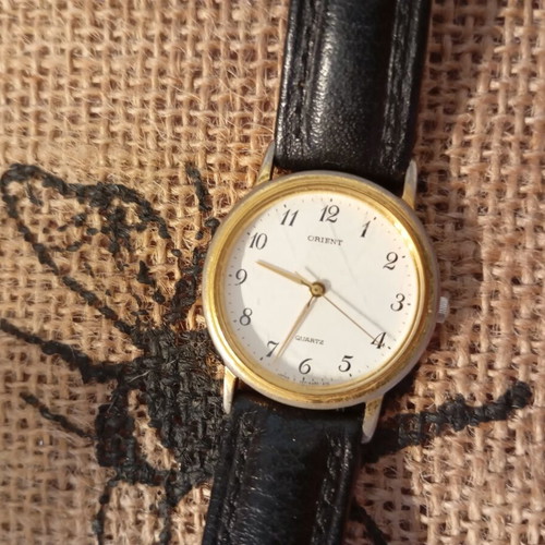 Orient vintage watch used, black and gold, unisex