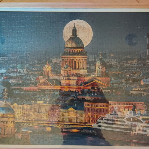 Framed puzzle like new, dimensions 0.53x0.73 m