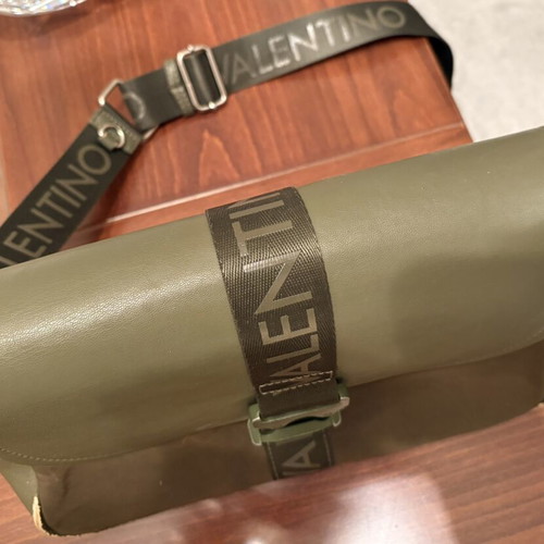 Valentino crossbody bag used, green, slightly faded corners