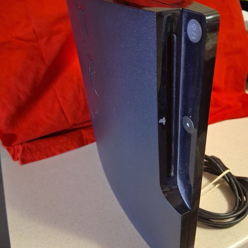 Sony Playstation 3 console with power and HDMI cables