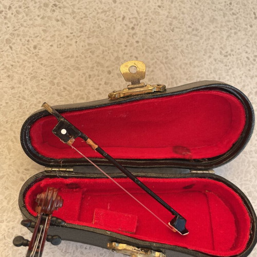 Small vintage violin with case and bow, decorative