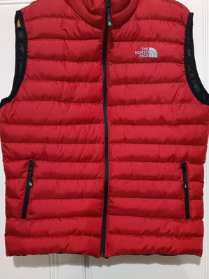 The North Face sleeveless jacket used, size M, red