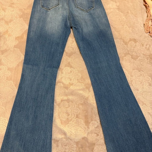 Fifty Carat jeans like new with knee rips, size 28