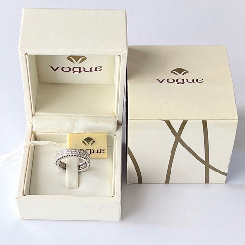 Vogue .925 Solid Silver Ring new, platinum plated with zirconia