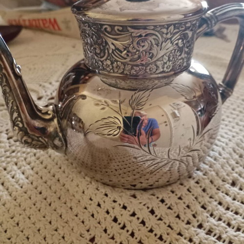 Antique silver plated teapot, sugar bowl and creamer like new