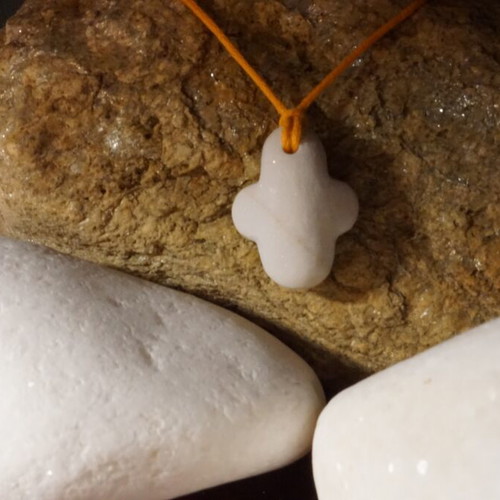 Collectible Cycladic marble and stone cross pendant, hand-carved