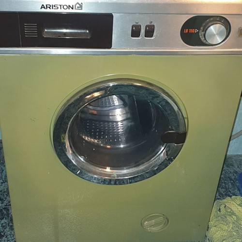 Vintage 1970s home appliance set used, General Electric fridge, Kenmore stove, Ariston washer