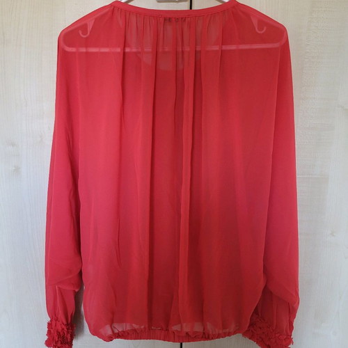 Coral sheer blouse like new with floral sleeve details
