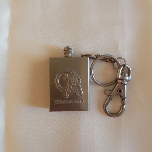 Vintage biker legend keychain lighter like new, nickel color