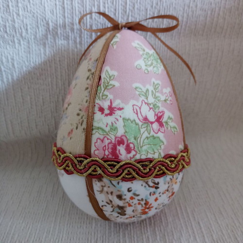 Decorative egg used beige pink floral for Easter and spring decor