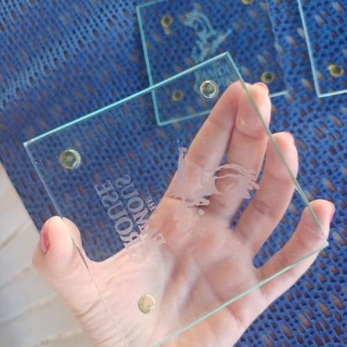 Glass coasters with some minor damage