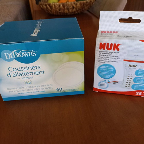 Dr. Brown breast pads and breast milk storage bags like new