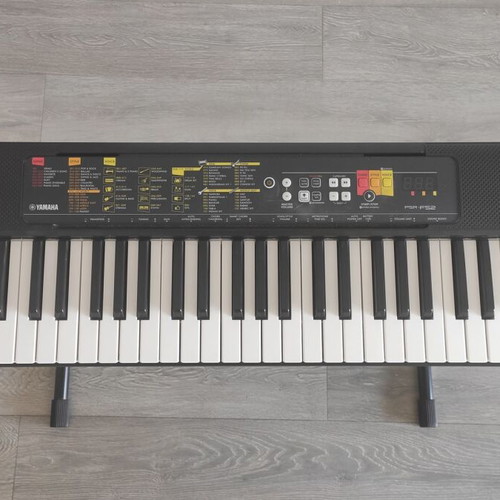 Yamaha Portable Keyboard PSR-F52 with power supply and stand